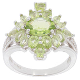 Elegant Green Peridot and Diamond Accent Sterling Silver Ring, showcasing a stunning round and marquise cut design.